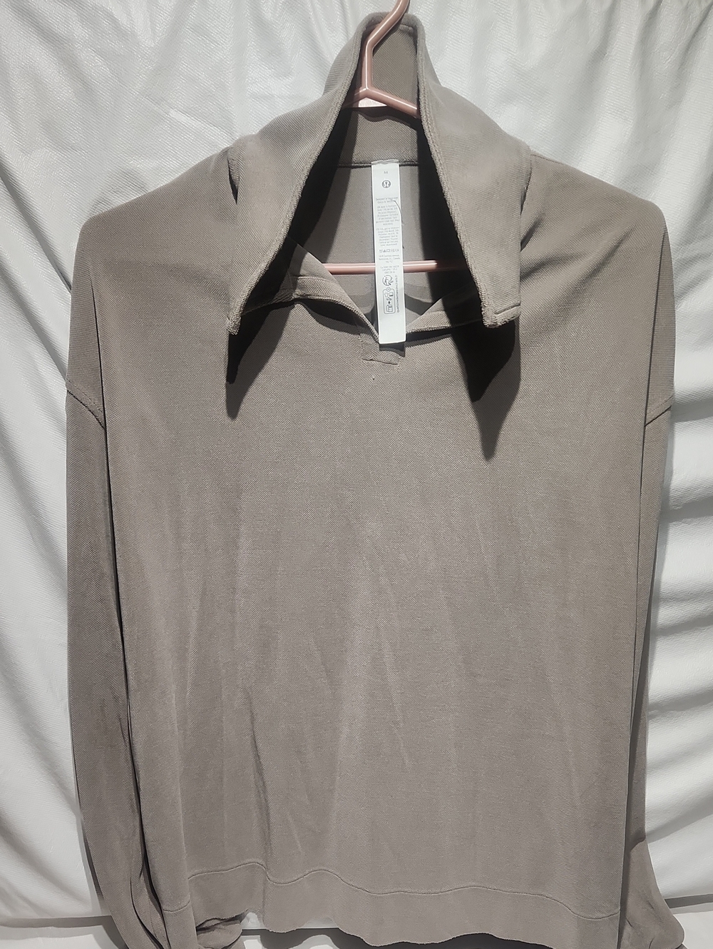49. Lululemon oversized Polo M